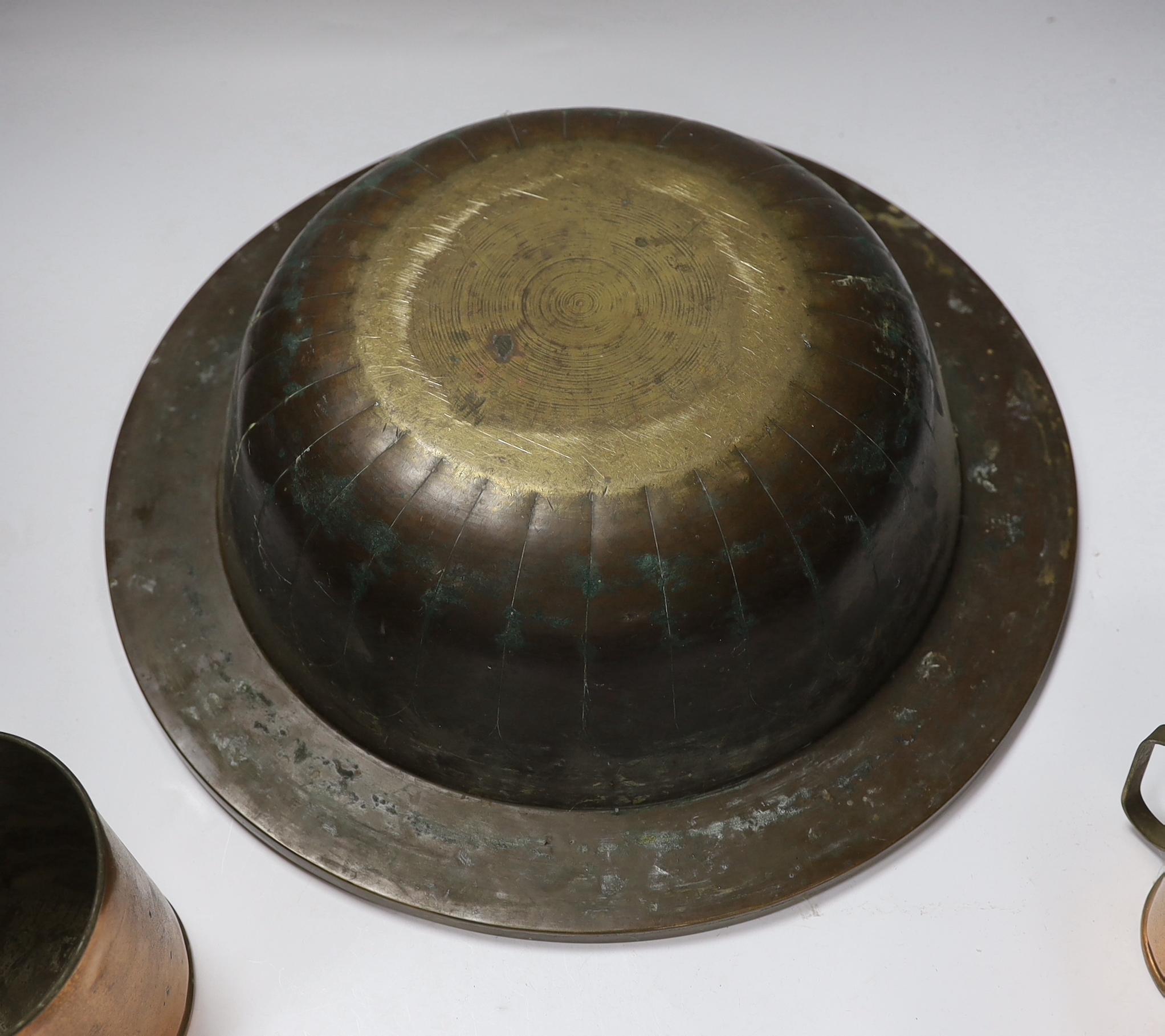 A miner's brass Davy lamp, signed E.Thomas & Williams, a large brass bowl and three graduated copper measures
